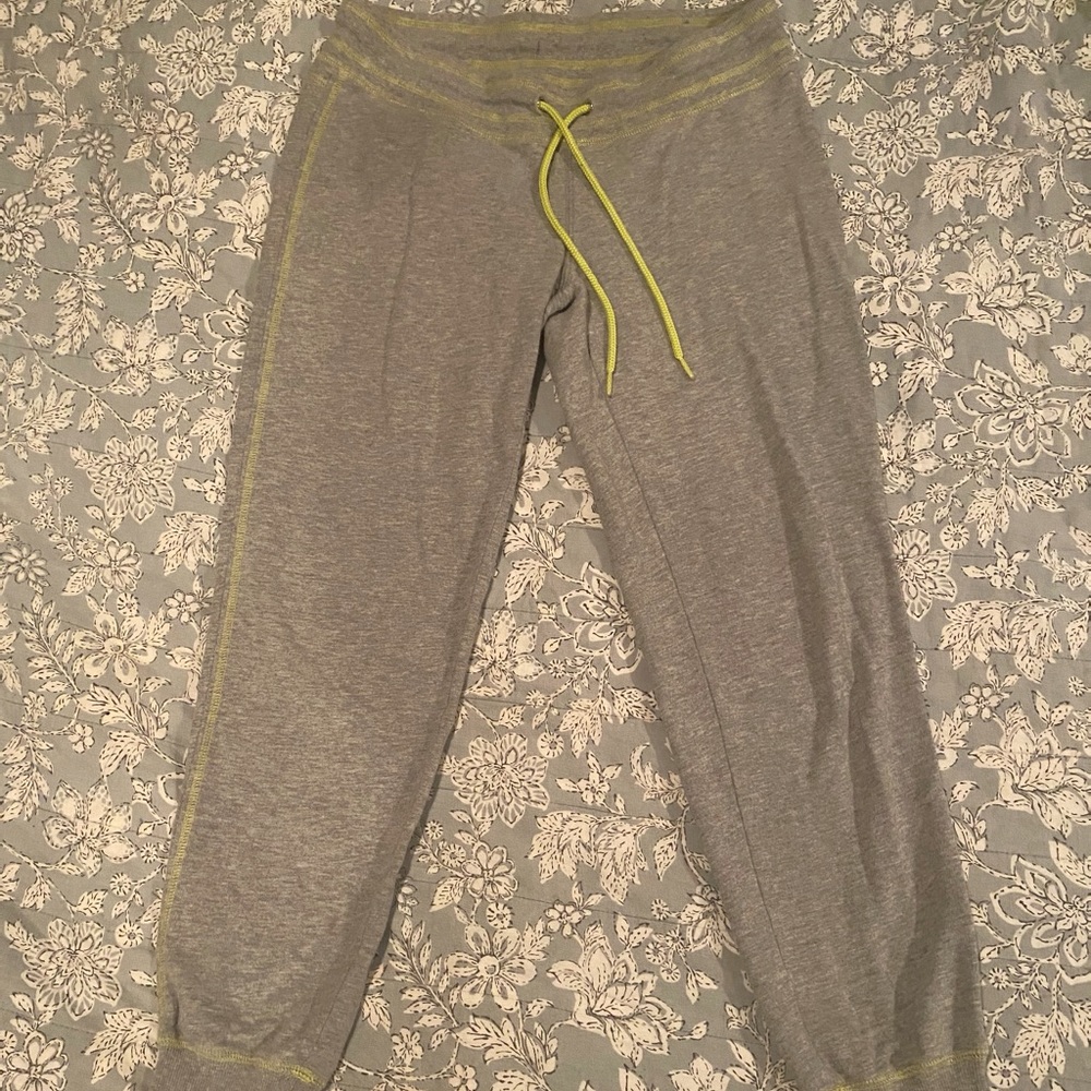 Grey joggers with green accent
